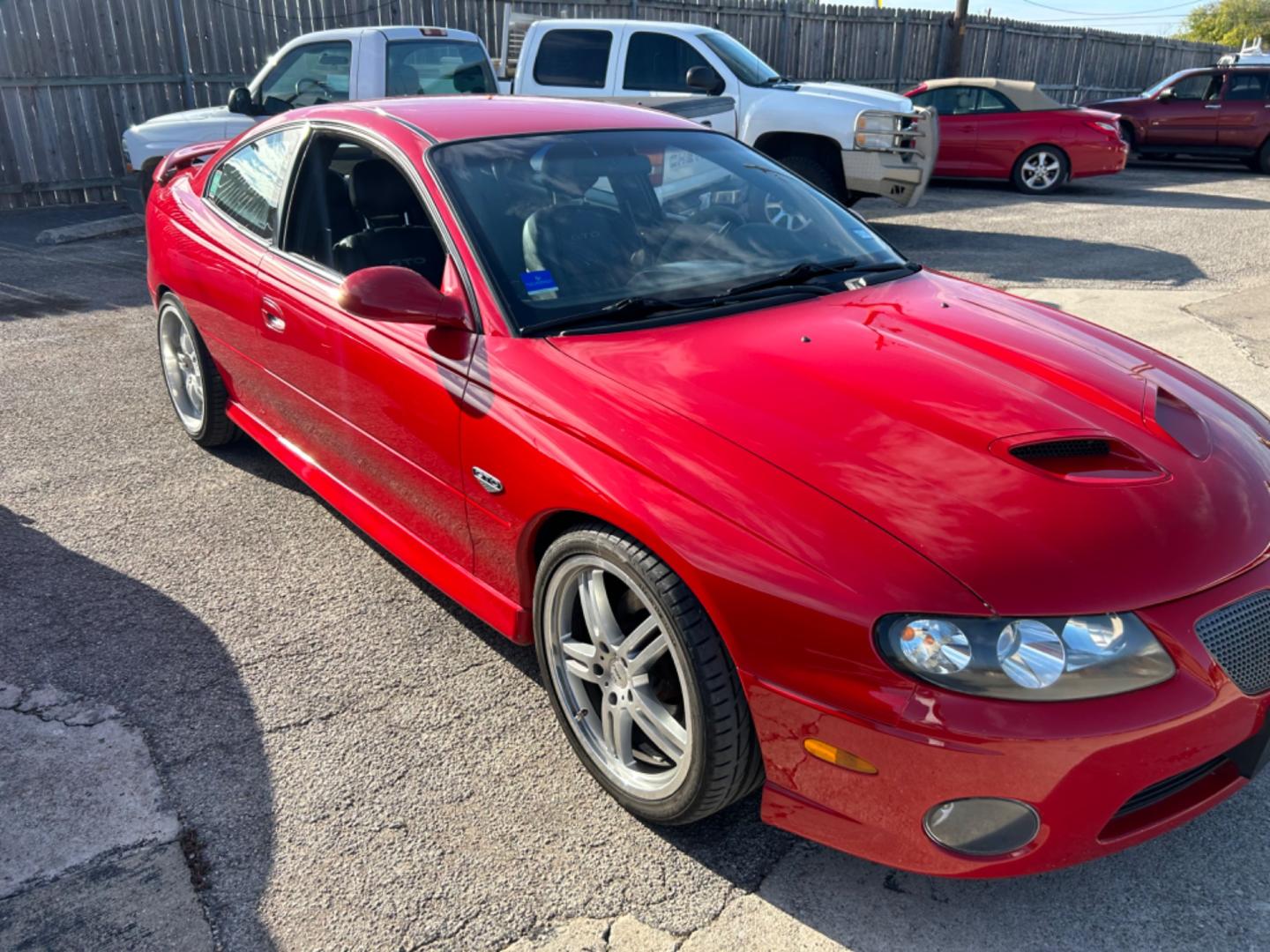 2006 Red Pontiac GTO Coupe (6G2VX12U96L) with an 6.0L V8 OHV 16V engine, located at 1687 Business 35 S, New Braunfels, TX, 78130, (830) 625-7159, 29.655487, -98.051491 - Photo#3